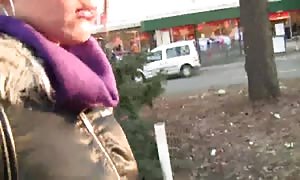 blowjob by a stunning brown-haired in the street in outside
 porn