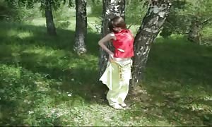 Crazy-minded Russian hotty is deep throat my shaft right in the woods