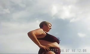 Russian mature huge-boobed on the beach! amateur!