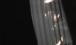 blonde peeping tom in dressing condominium