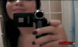 Self shooting female
 eats her boobs